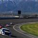 Chase Elliott ahead of a pack of cars during Monster Energy NASCAR Cup Series qualifying at Auto Club Speedway.